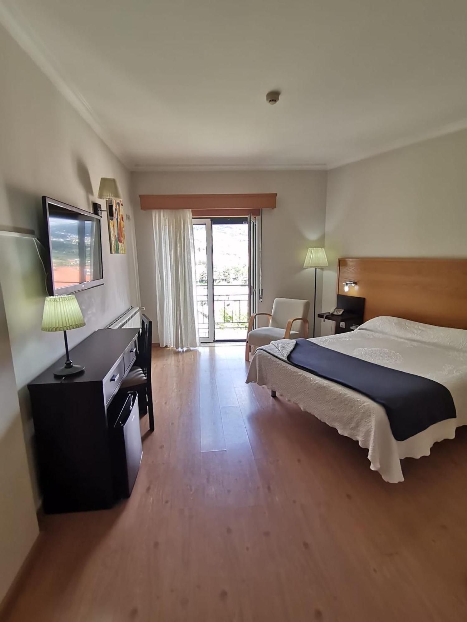 Hotel Covilha Jardim Bagian luar foto